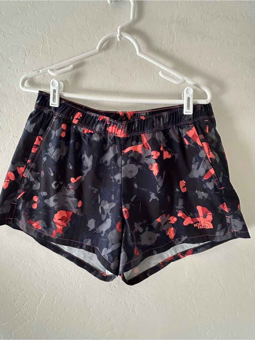 The North Face Women’s Black with Coral Print Athletic Shorts